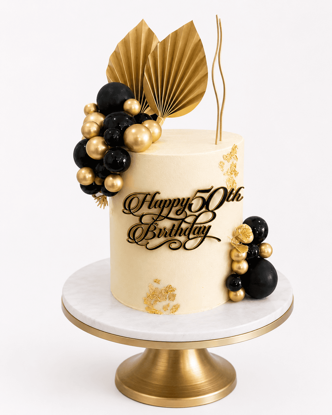 Elegant black and gold 50th birthday cake by Glory Treats