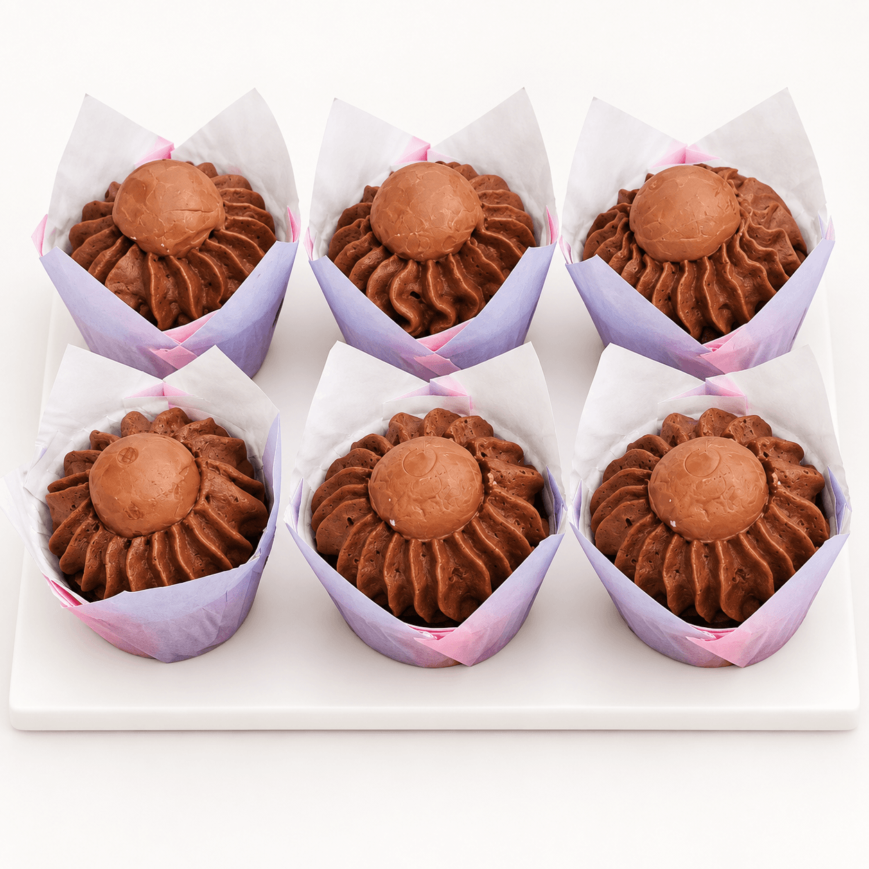 Chocolate truffle-topped cupcakes by Glory Treats