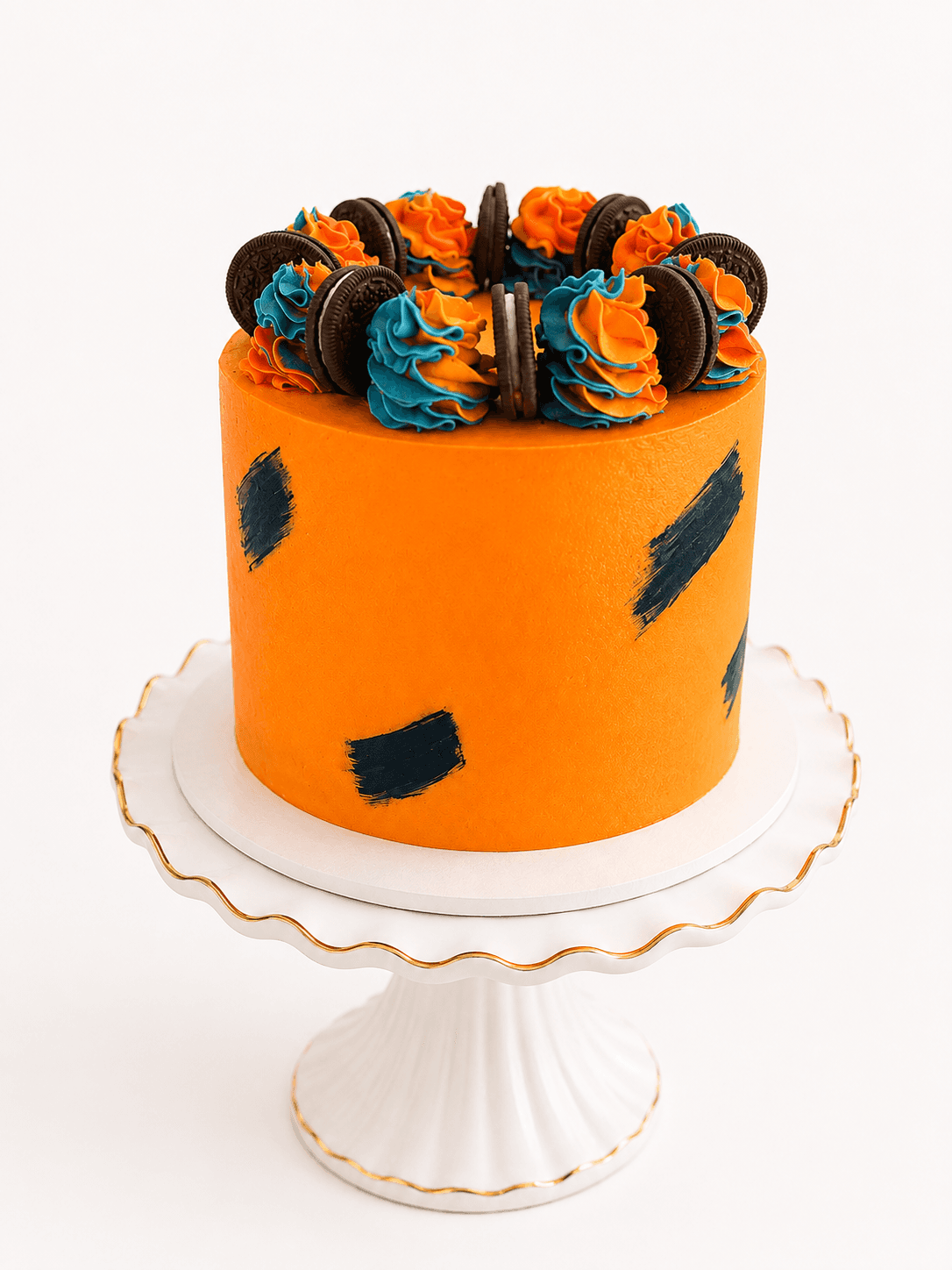 Orange and teal Oreo drip kids birthday cake by Glory Treats