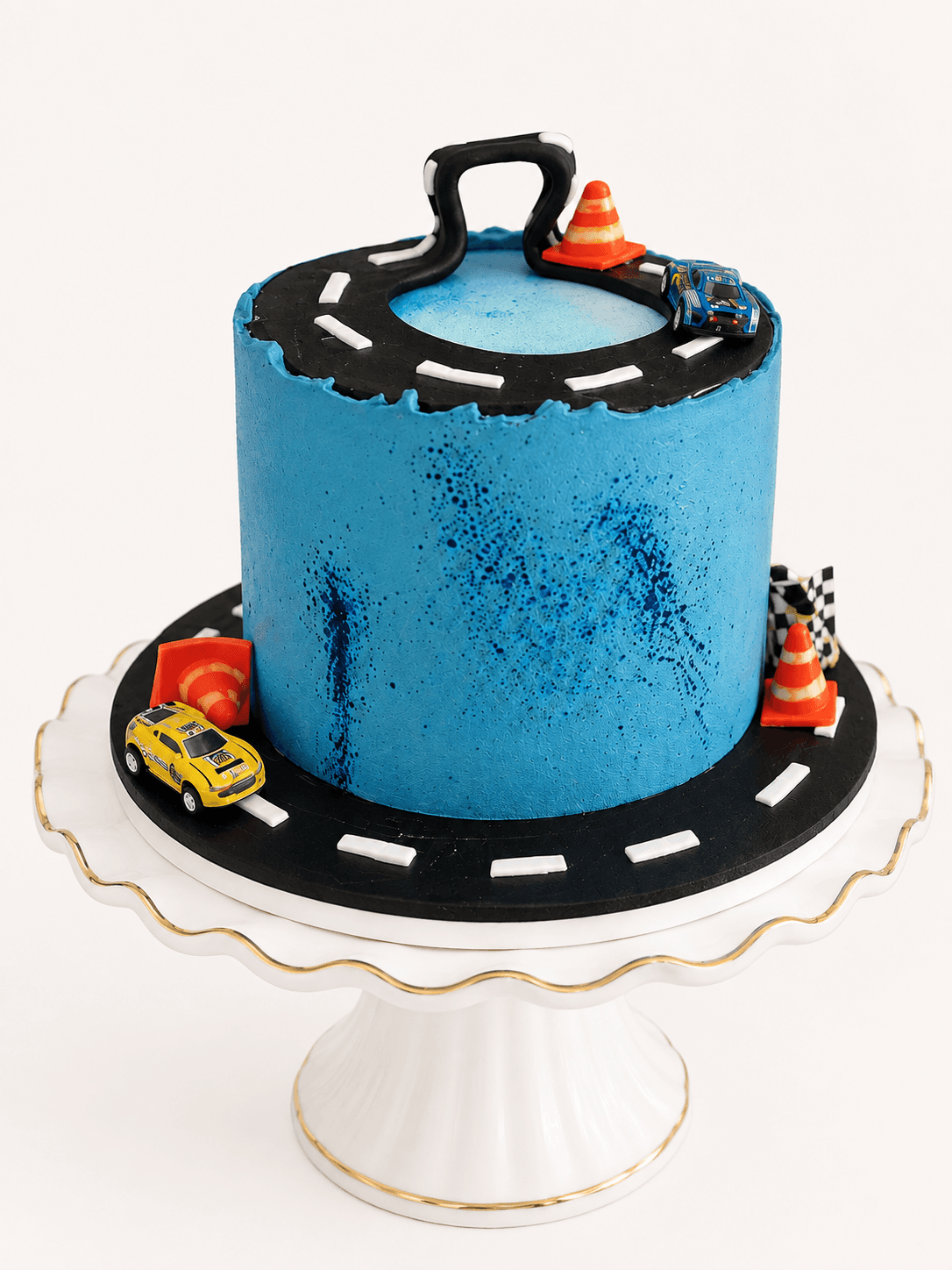 Blue race track themed kids birthday cake by Glory Treats
