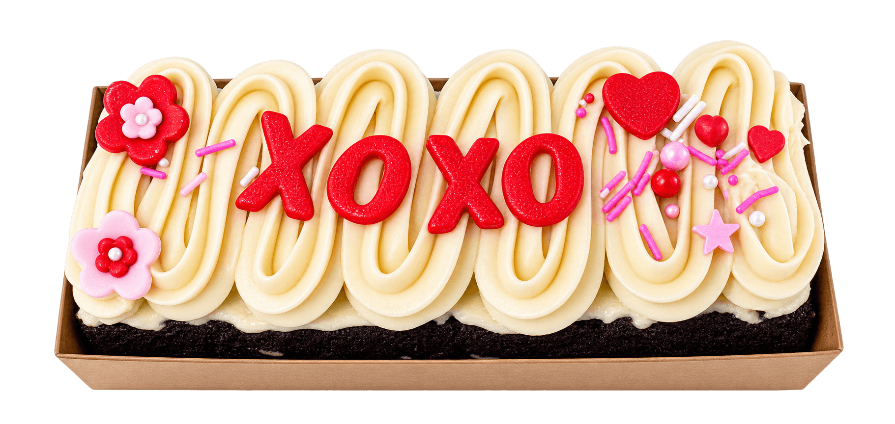 Mini loaf cake decorated 'XOXO' with hearts and flowers by Glory Treats